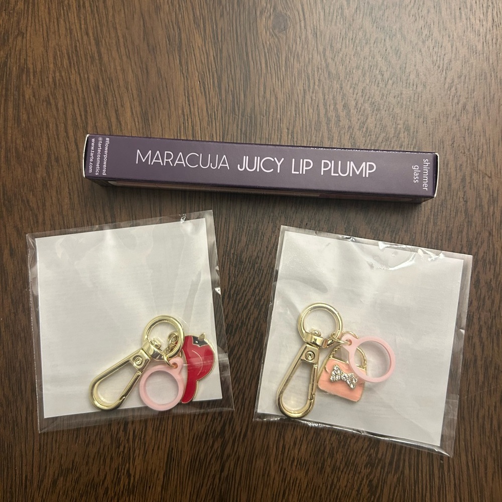 Tarte Maracuja Juicy Lip Plump with Red bird and bow purse charm/keychain.